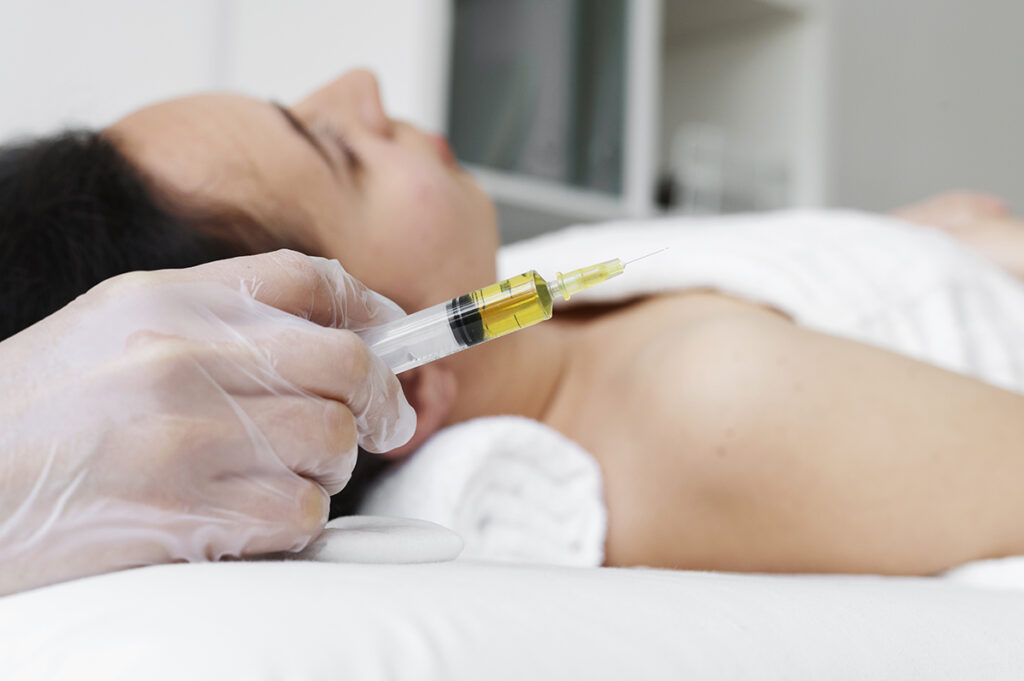 side-view-healthcare-professional-holding-syringe